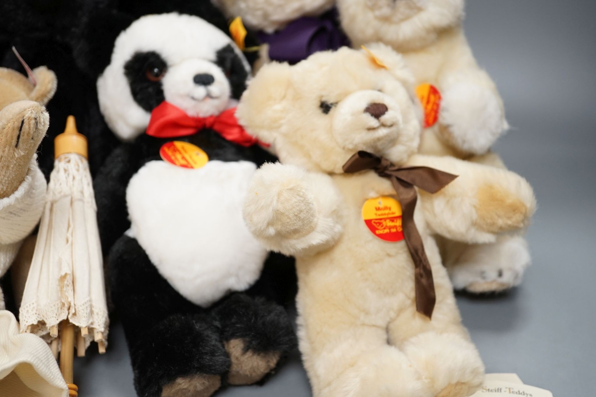 Four post war Steiff animals with a 'Pat and Nora' Limited Edition Steiff with parasol but no box and a white Limited Edition Steiff bear with white label for Hamleys